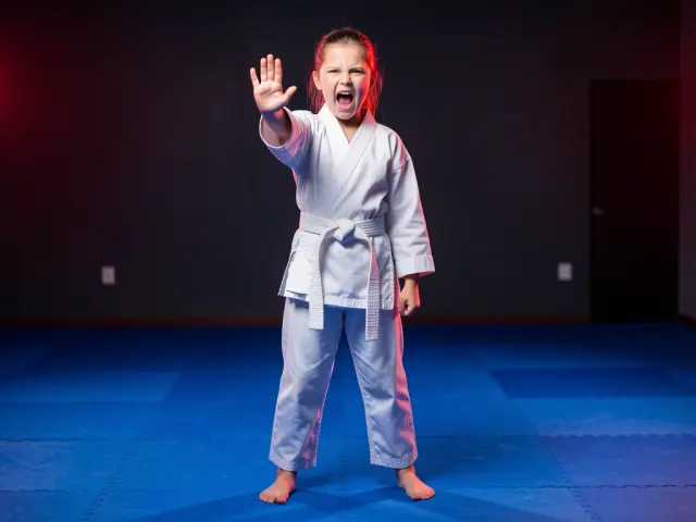 A child demonstrating the a loud, strong no
