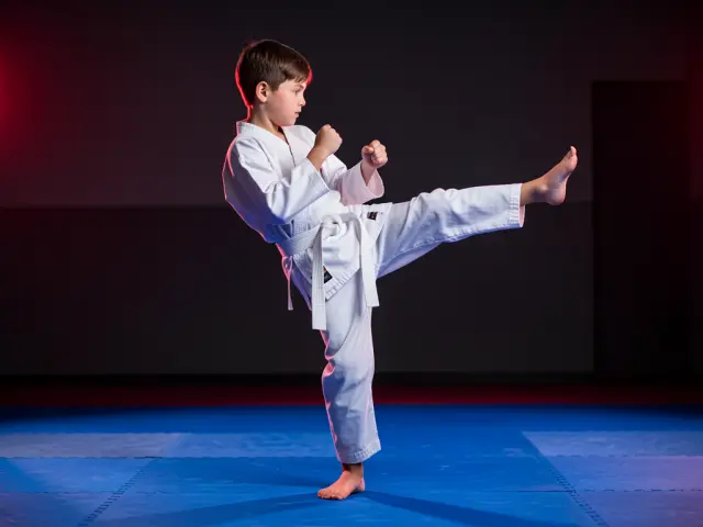 A child demonstrating the front kick