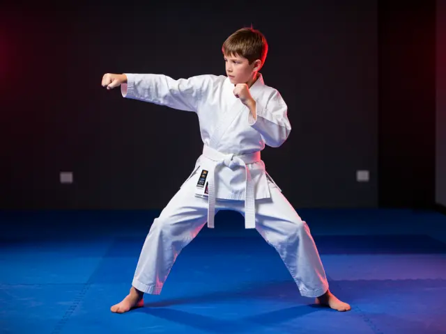 A child demonstrating the jab