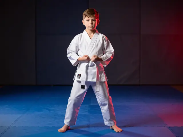 A child demonstrating the ready stance