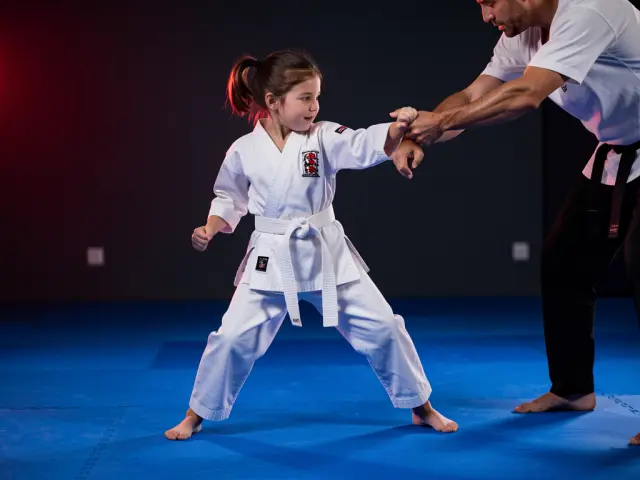 A child demonstrating the wrist-grab escape